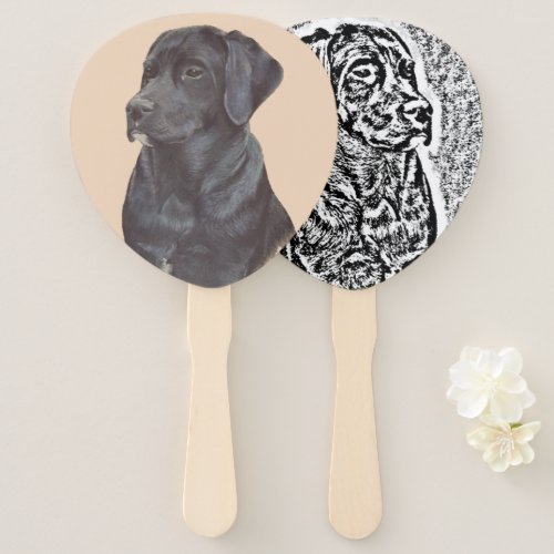 unique portrait of cute black labrador dog hand fan