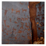 Unique Southwest Petroglyph Ceramic Tile<br><div class="desc">Unique Southwest Petroglyph Ceramic Tile is a rock painting that displays art from Native American cultures. Petroglyphs (also called rock engravings) are pictogram and logogram images created by removing part of a rock surface by incising, picking, carving, and abrading. Outside North America, scholars often use terms such as "carving", "engraving",...</div>