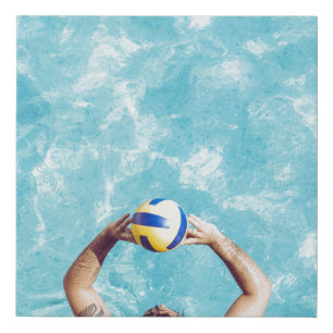 Unknown person playing beach volleyball faux canvas print