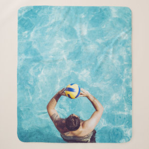 Unknown person playing beach volleyball sherpa blanket