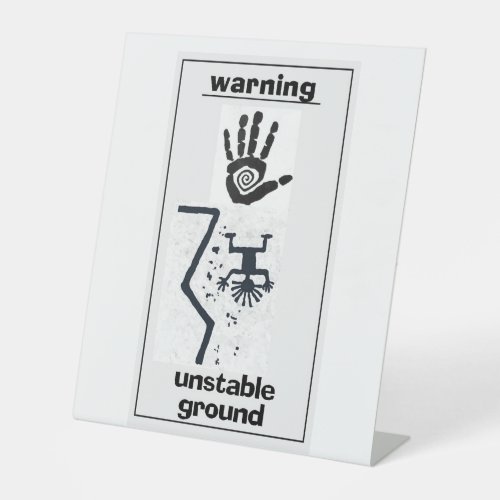 Unstable Ground _ a modern petroglyph Pedestal Sign