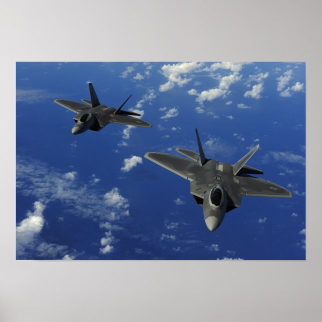 US Air Force F-22 Raptors in flight near Guam Poster (Front)