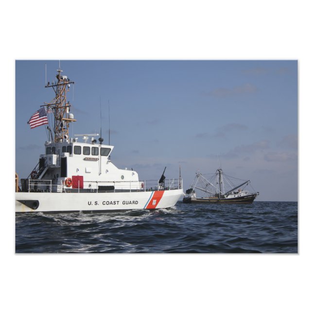 US Coast Guard Cutter Marlin patrols the waters Photo Print (Front)
