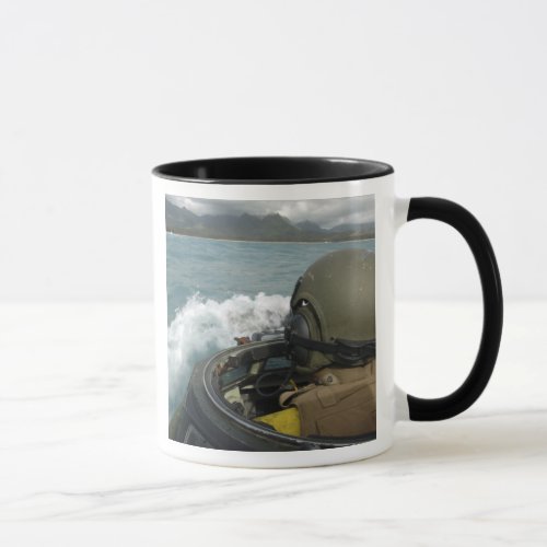 US Marine driving an amphibious assault vehicle Mug