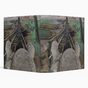 US Marine fires an M2 50-caliber machine gun Binder