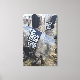 US Marines and Sailors don riot gear Canvas Print