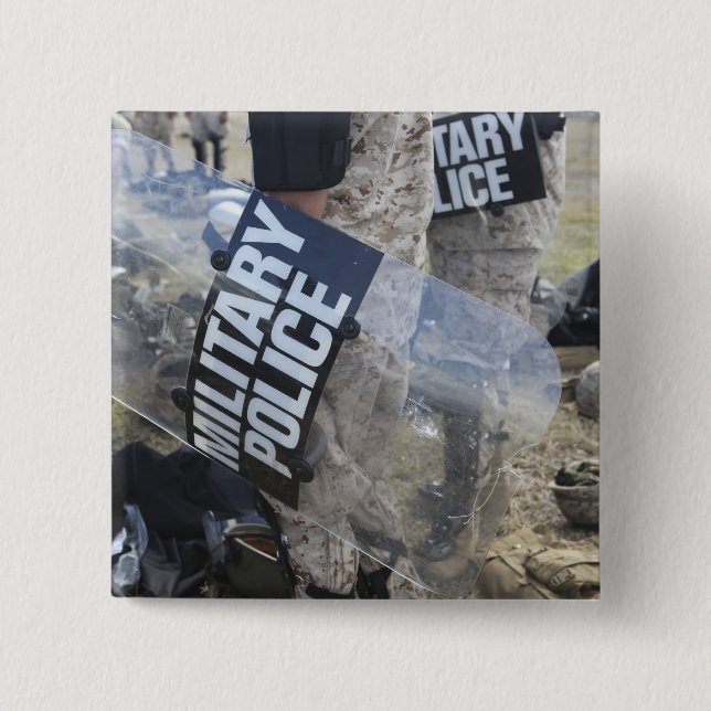 US Marines and Sailors don riot gear Pinback Button (Front)
