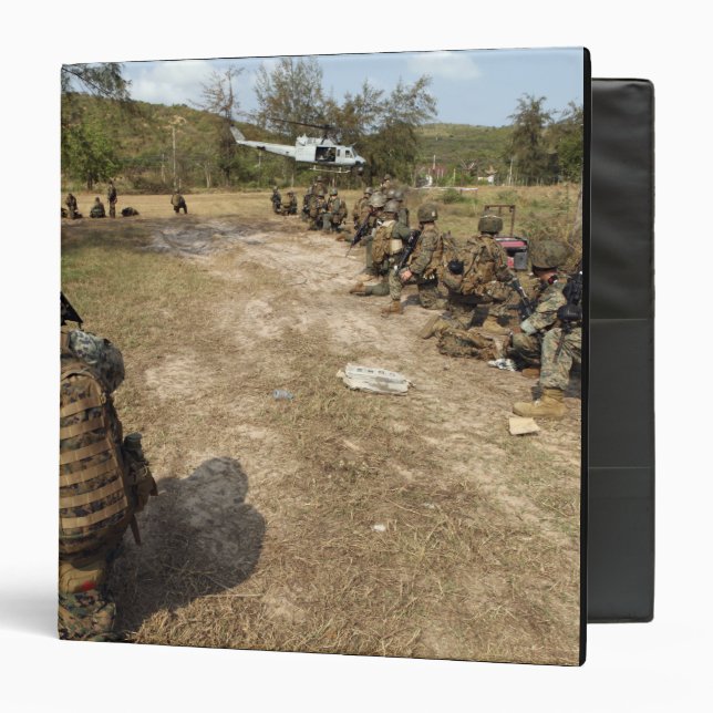 US Marines provide security as a UH-1N Binder (Front/Inside)