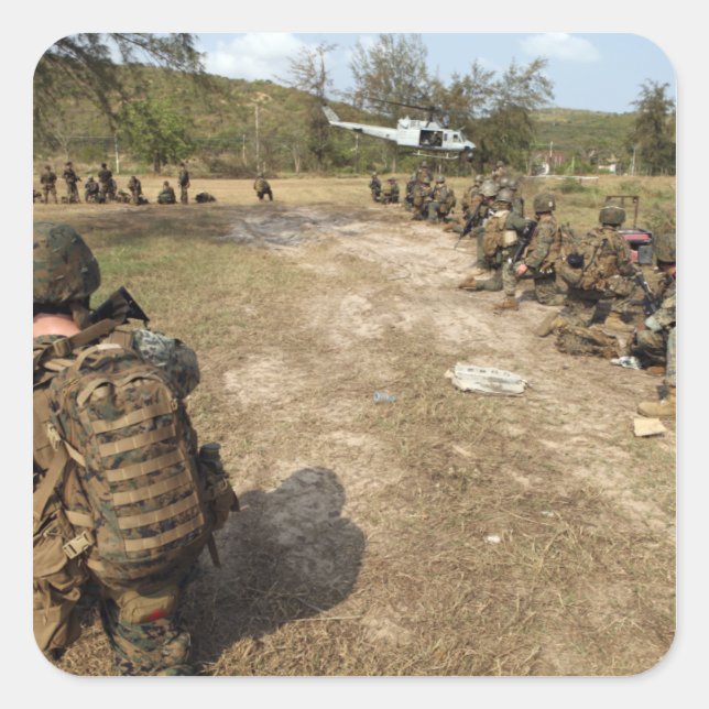 US Marines provide security as a UH-1N Square Sticker (Front)