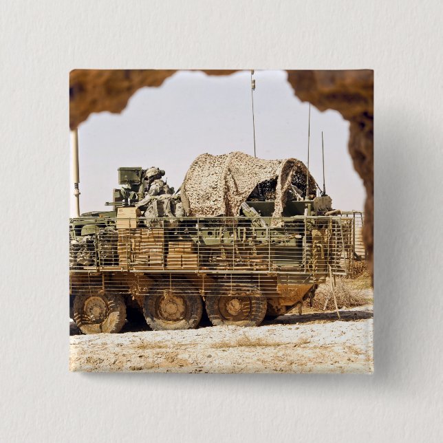 US Soldiers conduct a combat patrol in Afghanis Button (Front)