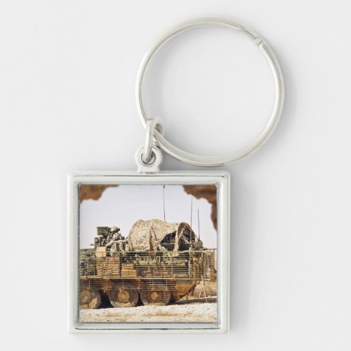 US Soldiers conduct a combat patrol in Afghanis Keychain
