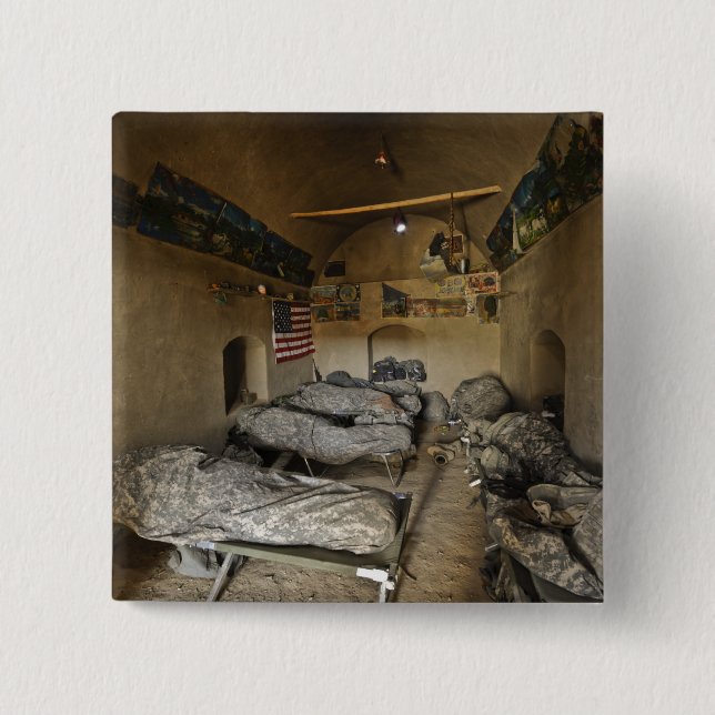 US Soldiers sleep in an abandoned mud house Button (Front)