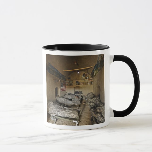 US Soldiers sleep in an abandoned mud house Mug (Right)