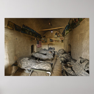 US Soldiers sleep in an abandoned mud house Poster