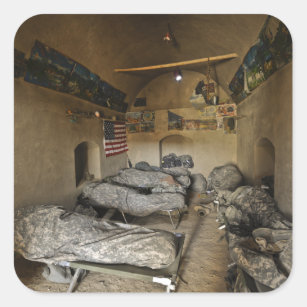 US Soldiers sleep in an abandoned mud house Square Sticker