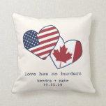 USA and Canada Heart Flags Wedding Throw Pillow<br><div class="desc">Love has no borders! Our super cute personalized flag throw pillow for US and Canada couples features the sentiment in navy blue typewriter style lettering, with the USA and Canada flags inside hand-drawn style hearts. Shown on a cream / ivory background. Add the couple's names and wedding date for a...</div>