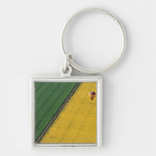 USA, Arizona, Val Vista. Hot-air balloons soar Keychain
