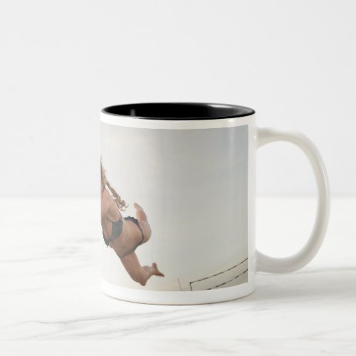USA California Los Angeles woman playing Two_Tone Coffee Mug