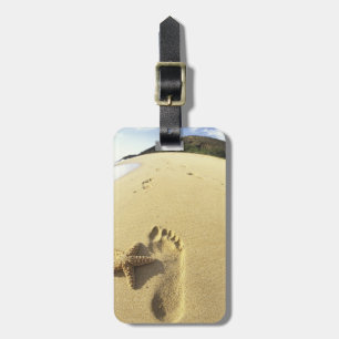 USA, Hawaii, Maui, Makena Beach, Footprint and Luggage Tag