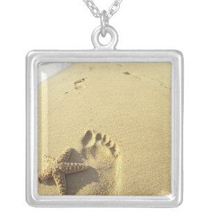 USA, Hawaii, Maui, Makena Beach, Footprint and Silver Plated Necklace