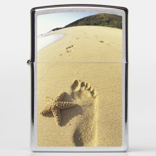 USA, Hawaii, Maui, Makena Beach, Footprint and Zippo Lighter (Front)