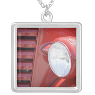 USA, Maine, Owl's Head. Headlight and partial Silver Plated Necklace