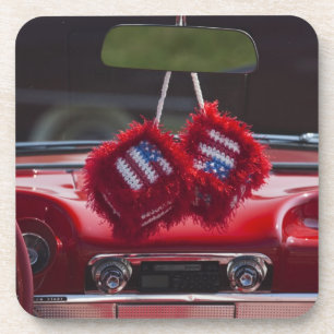 USA, Massachusetts, Gloucester. Fuzzy dice with Beverage Coaster