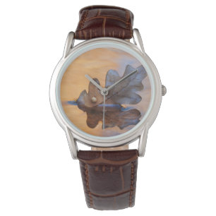 USA, New Mexico. Oak leaf in stream Watch