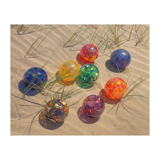 USA, Oregon. Colorful Glass Floats On Sand Dune Wood Wall Decor