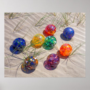 USA, Oregon. Colourful Glass Floats On Sand Dune Poster