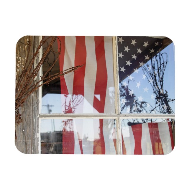 USA, Oregon, Shaniko. Flag in window next to Magnet (Horizontal)
