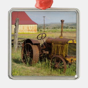 USA, Oregon, Shaniko. Rusty vintage tractor in Metal Ornament