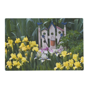 USA, Pennsylvania. Garden irises grow around Placemat