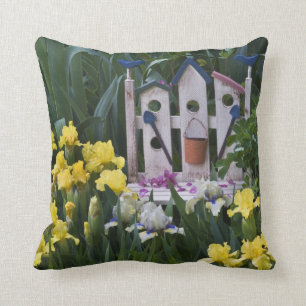 USA, Pennsylvania. Garden irises grow around Throw Pillow