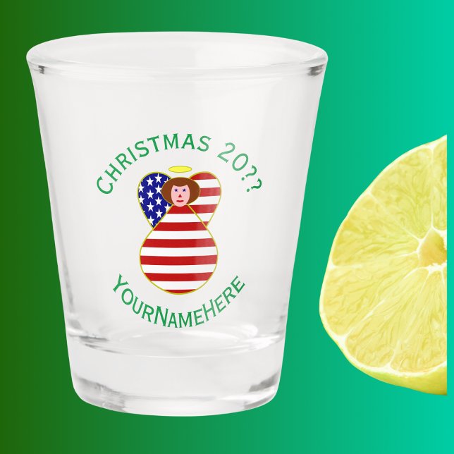 USA Red Haired Angel Christmas Flag Personalized Shot Glass (Christmas shot glass has red haired angel wearing USA Flag. Green text for name, holiday, and year.)