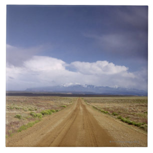 USA, Utah, Dirt road crossing landscape Ceramic Tile