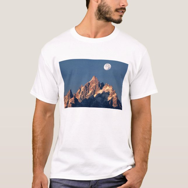 USA, Wyoming, Grand Teton NP. A full moon sets T-Shirt (Front)