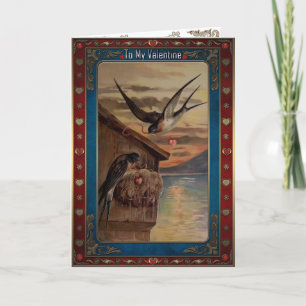 Valentine's. Swallows with hearts on ribbons. Holiday Card