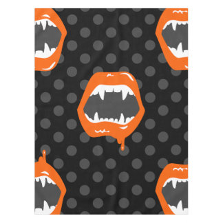 vampire lips monster fanged creature orange tablecloth