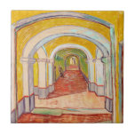 Van Gogh Corridor Asylum Yellow Impressionist Art Ceramic Tile<br><div class="desc">This evocative masterpiece, Corridor in the Asylum (1889), was created by Vincent van Gogh during his stay at the Saint-Paul-de-Mausole monastery in Saint-Rémy. The painting showcases Van Gogh’s legendary mastery of light and perspective, using bold, expressive brushstrokes and a vibrant palette of golden yellows and earthy reds. The dramatic receding...</div>