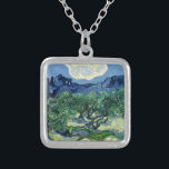 Van Gogh The Olive Trees Landscape Painting Silver Plated Necklace<br><div class="desc">Immerse yourself in the vibrant, swirling world of Vincent Van Gogh with this iconic landscape, "The Olive Trees." This celebrated Post-Impressionist painting captures the rugged beauty and expressive energy of the olive groves with Van Gogh's distinctive, agitated brushstrokes. The striking blues of the sky and undulating hills complement the vibrant...</div>
