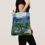 Van Gogh The Olive Trees Landscape Painting Tote Bag<br><div class="desc">Immerse yourself in the vibrant, swirling world of Vincent Van Gogh with this iconic landscape, "The Olive Trees." This celebrated Post-Impressionist painting captures the rugged beauty and expressive energy of the olive groves with Van Gogh's distinctive, agitated brushstrokes. The striking blues of the sky and undulating hills complement the vibrant...</div>