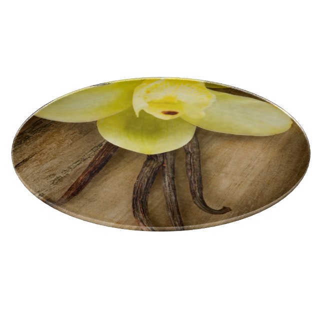 Vanilla Pods and Flower over Wooden Background Cutting Board (Corner)