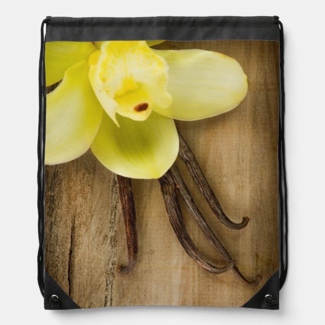 Vanilla Pods and Flower over Wooden Background Drawstring Bag (Front)
