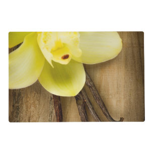 Vanilla Pods and Flower over Wooden Background Placemat