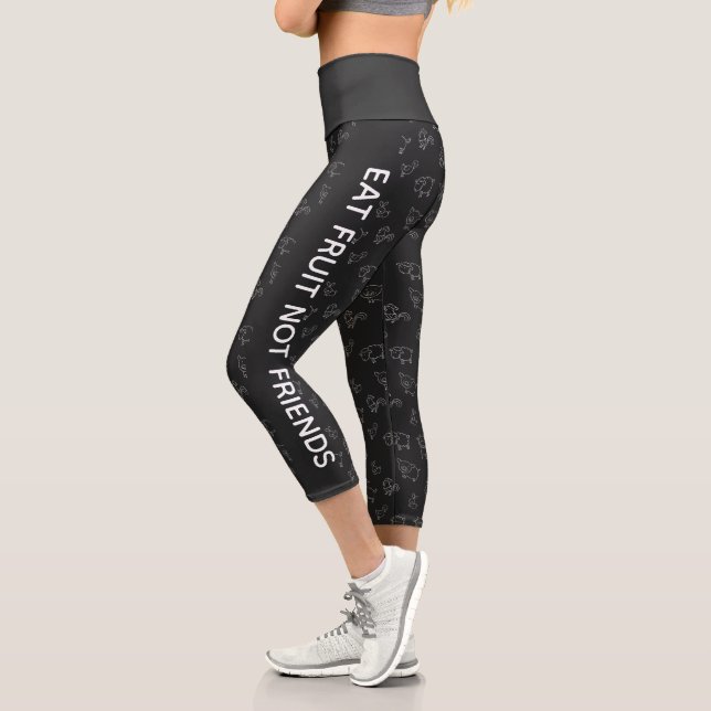 Vegan Eat fruit not friends black cartoon animals Capri Leggings (Left)