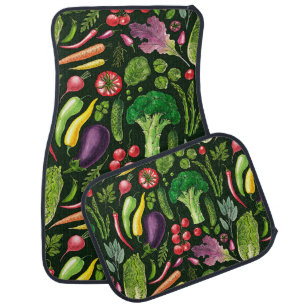 Vegetable and herbs garden harvest on black car floor mat