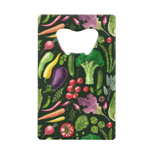 Vegetable and herbs garden harvest on black credit card bottle opener