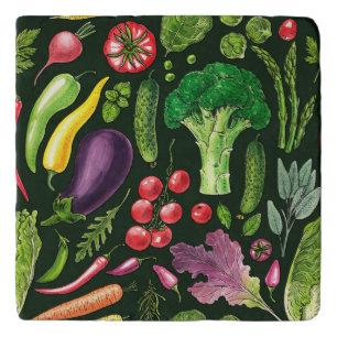 Vegetable and herbs garden harvest on black trivet