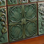 Verdant Symphony Art Nouveau Ceramic Tile<br><div class="desc">This stunning ceramic tile is a homage to the Art Nouveau style, with a symphony of verdant hues and organic motifs. The deep emerald and forest green background is beautifully complemented by the rich olive and subtle hunter-green detailing. Four elegant leaves unfurl in each corner, surrounding a central quatrefoil that...</div>